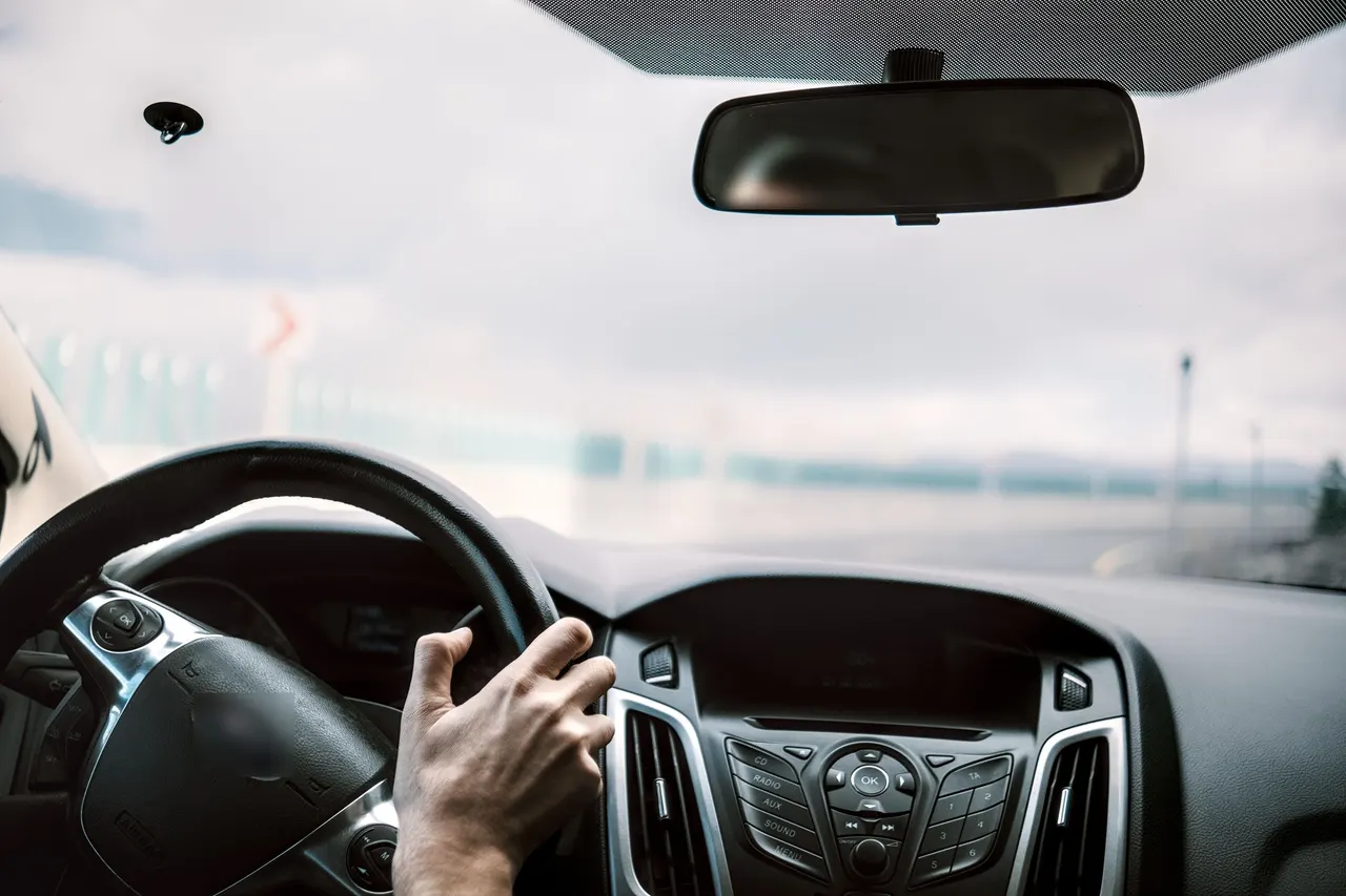 Driver's View from Inside a Car on a Road