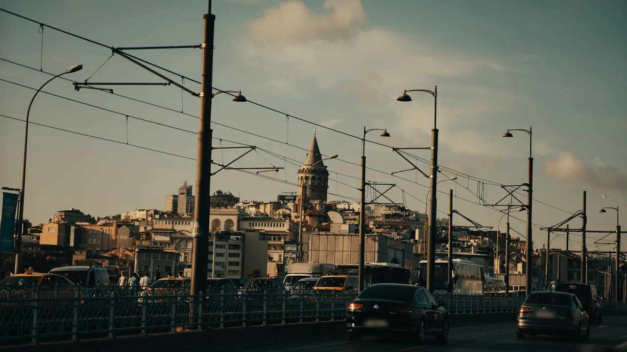 Galata Tower and bridge traffic in late afternoon